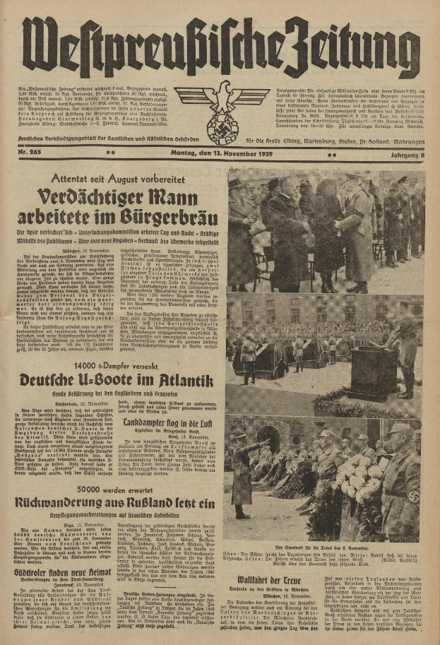 Schwarze Titelseite einer deutschen Zeitung vom 13. November 1939 mit der Schlagzeile "Weitpreubliche Zeitung" und einem Foto von Menschen in traditioneller deutscher Tracht, die scheinbar feiern.