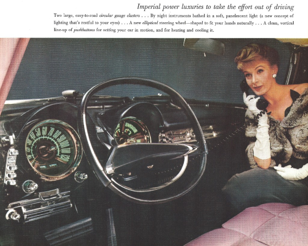 Ein Magazin-Artikel, der das Innere eines Autos zeigt, mit einem MÃ¤dchen auf der rechten Seite, das mit dem Handy spricht, einem Lenkrad und Tacho in der Mitte und einem Bedienfeld auf der linken Seite.