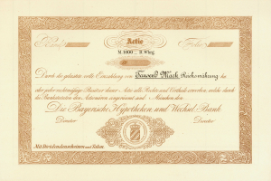 Alte Aktie mit goldenem Rand, der ein Männerporträt zeigt, wahrscheinlich eine Anleihe, mit gedrucktem Text.