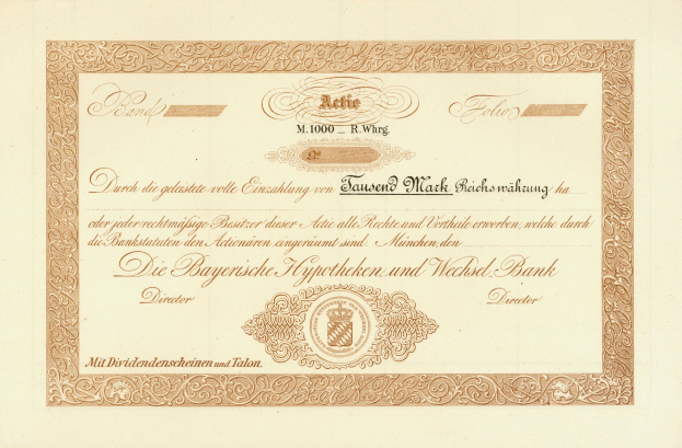 Alte Aktie mit goldenem Rand, der ein Männerporträt zeigt, wahrscheinlich eine Anleihe, mit gedrucktem Text.