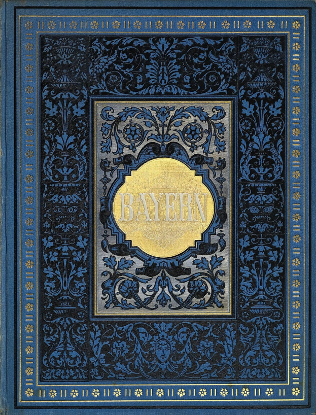 Ein blau-goldenes Buch mit dem Wort 'Bayern' auf dem Cover, das mit detaillierten Dekorationen versehen ist.