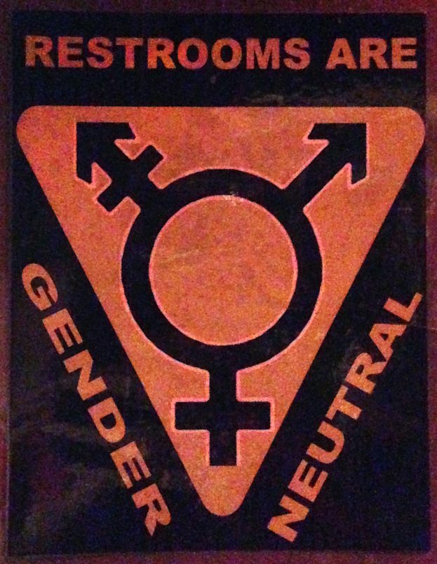 Ein Plakat mit der Aufschrift "Toiletten sind genderneutral" betont die Bedeutung von Geschlecht in Toiletten.