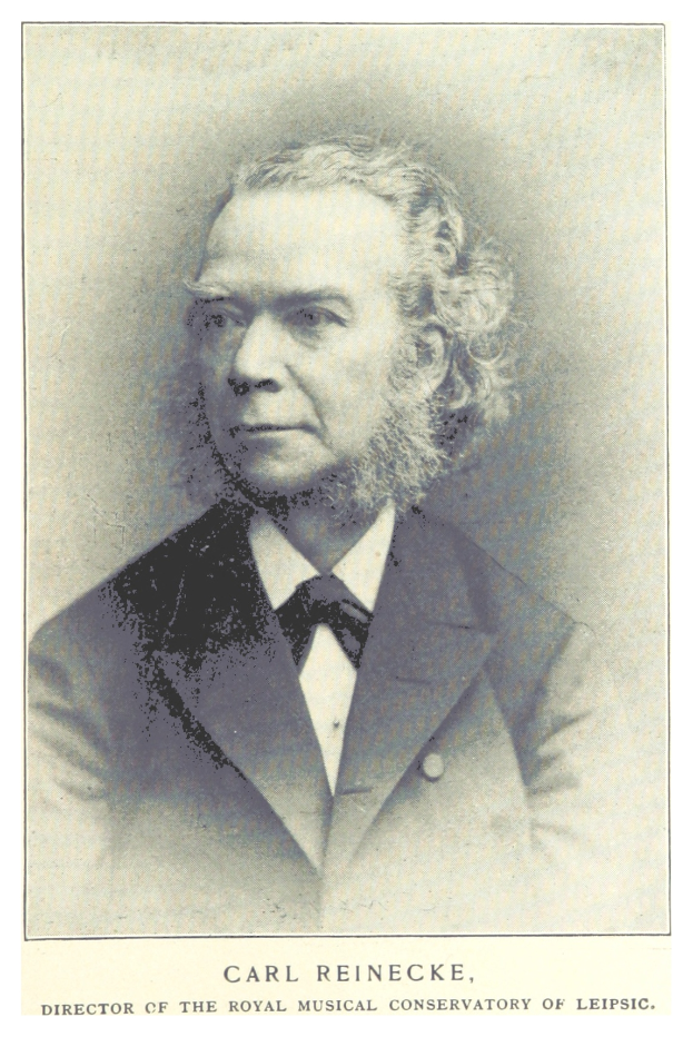 Schwarzes und weißes Porträt von Carl Reinecke, Direktor des Königlichen Musik-Konservatoriums Leipzig, in Anzug, mit Text am unteren Bildrand.