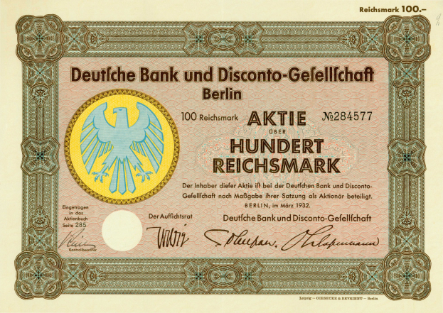 Ein altes deutsches Banknoten mit einer Vogeldarstellung und dem Text "Deutsche Bank und Disconto-Gefellichaft Berlin".