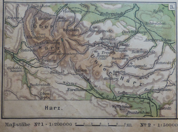 Ein detaillierter alter Stadtplan von Harz, Deutschland, der Straßen, Gebäude und Sehenswürdigkeiten zeigt, mit Text und Zahlen oben und unten.